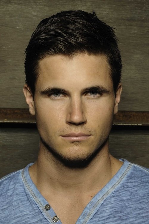 Robbie Amell as Renton in ARQ