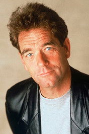 Huey Lewis as Agent Matheson in .com for Murder