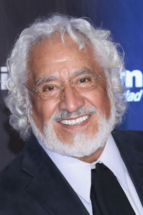 Rafael Inclán as Padre Ángel in No One Writes to the Colonel