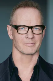 Aidan Devine as Roman in Dolan's Cadillac