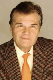 Fred Willard as Ed Harken in Anchorman: The Legend of Ron Burgundy