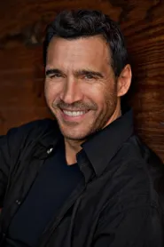 Adrian Paul as Roizman in The Secrets of Emily Blair