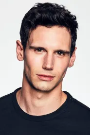 Cory Michael Smith as Georgie in May December