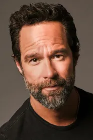 Chris Diamantopoulos as Guy de Cornet in The Art of the Steal