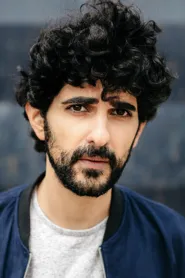Reza Brojerdi as Malik in Dirty Angels