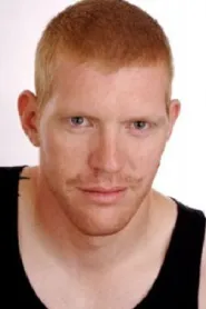 Reuben De Jong as Father (Suit) in Predator: Badlands