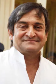 Mahesh Manjrekar as Javed in Slumdog Millionaire