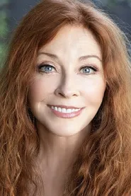 Cassandra Peterson as Host - Elvira, Mistress of the Dark in In Search of the Sanderson Sisters: A Hocus Pocus Hulaween Takeover