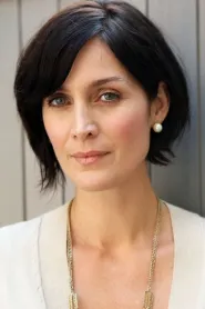 Carrie-Anne Moss as Kelly Hanson in Fireflies in the Garden